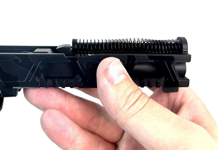 Guide rod and recoil spring seated