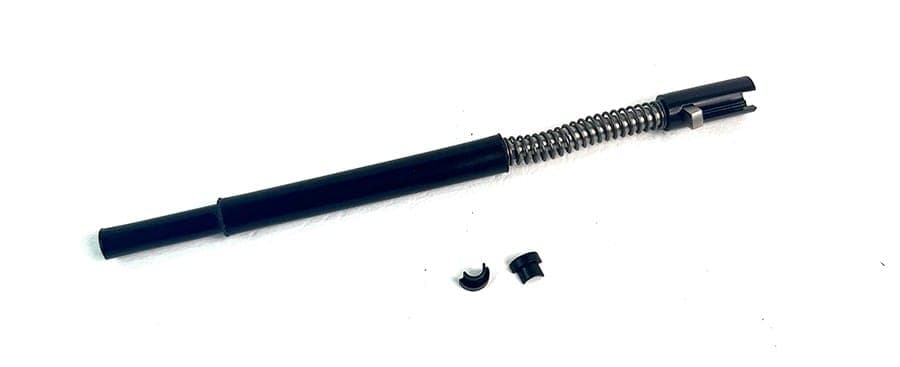 Using the channel liner tool to hold the firing pin spring