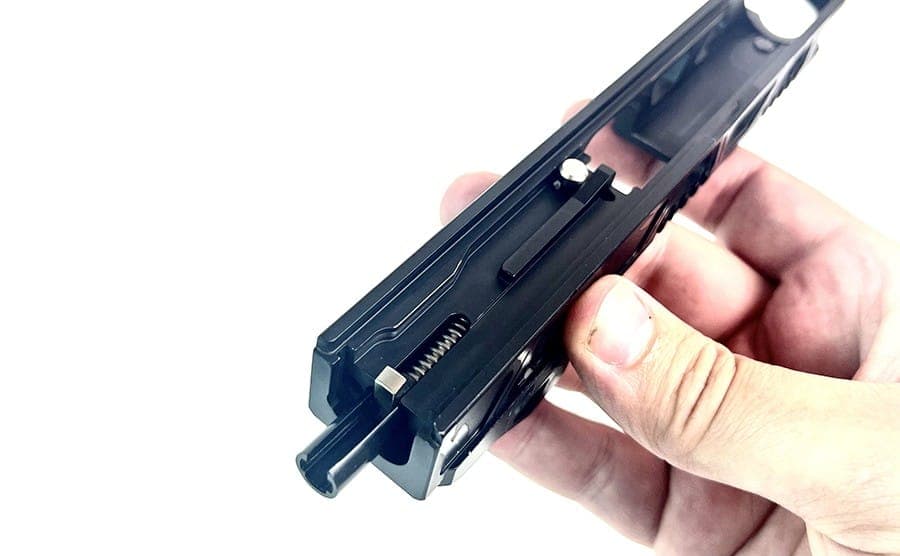 Inserting the firing pin assembly