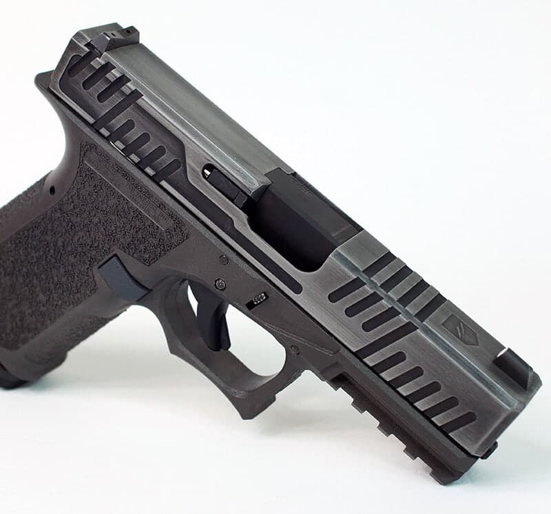 Shift slide in sniper grey with angular top cuts, on a black Glock 19 frame