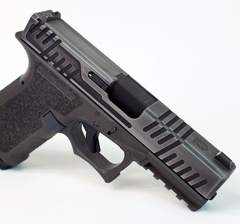 Shift slide in sniper grey with angular top cuts, on a black Glock 19 frame